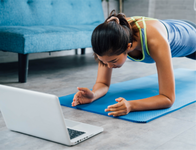 Woman working out watching a video