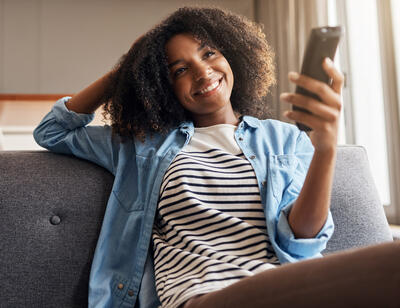 woman with tv remote